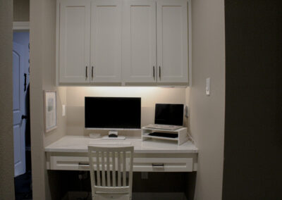white built-in desk area