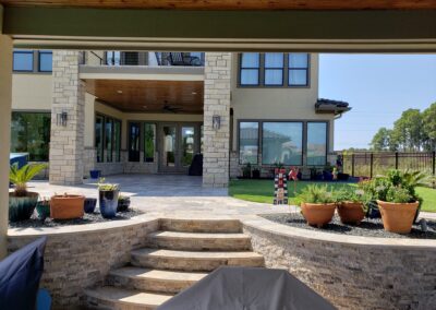 Snyder custom home landscaped back exterior